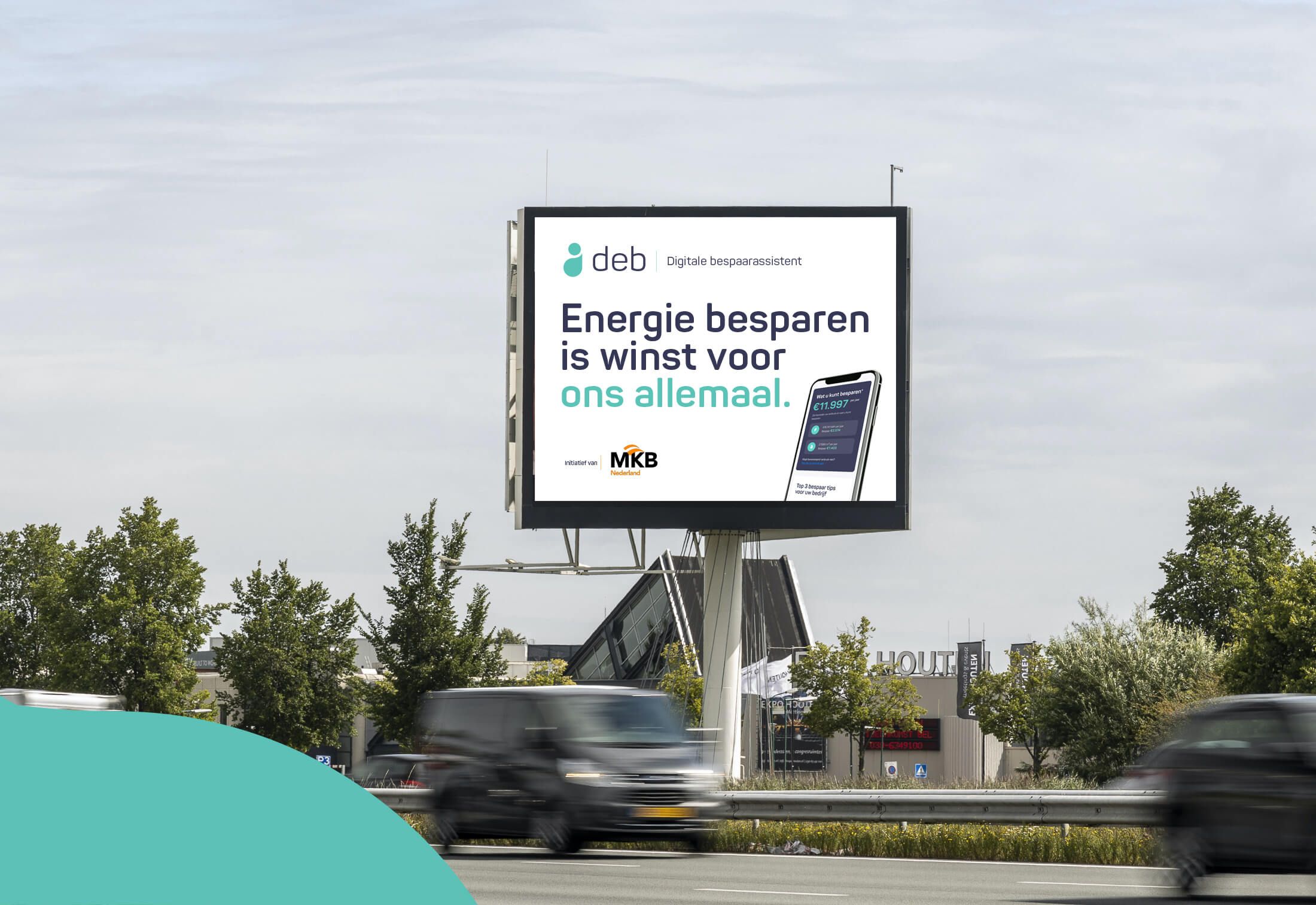 Reclamebord langs de snelweg: "Bespaar energie, win samen!.