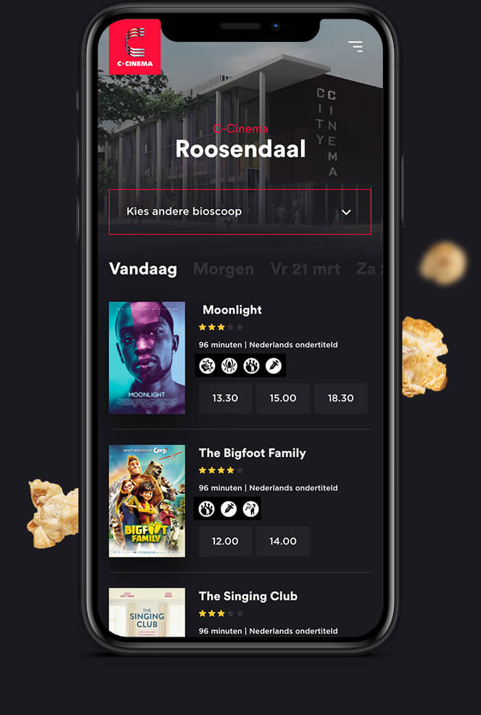 Telefoonscherm met film-app: filmkeuze, beoordelingen, aanvangstijden en popcorn bij de hand.
