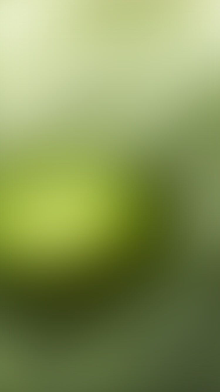 Een rustgevende abstracte achtergrond met zachte, vage groene kleurverlopen.