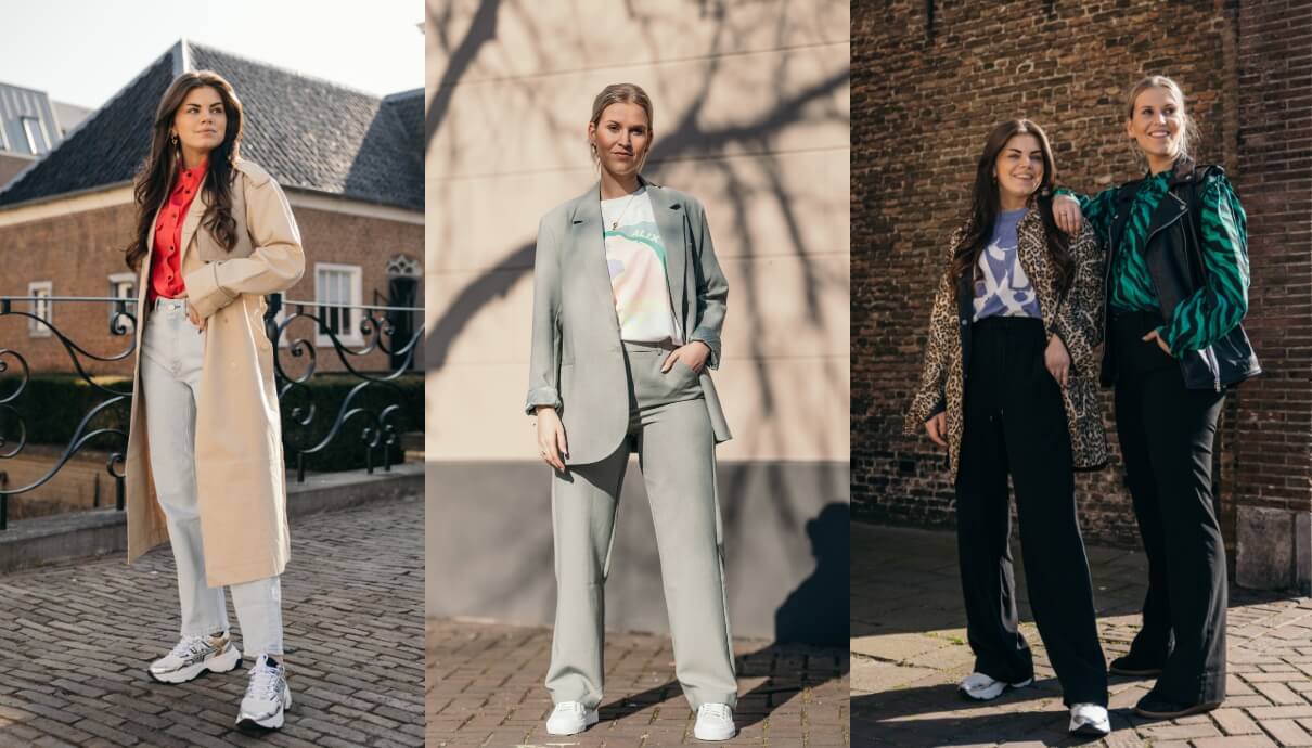 Drie vrouwen poseren buiten in chique kleding: trenchcoat, broekpak en jasjes met patroon.